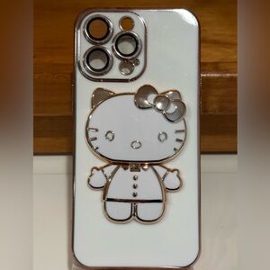 Hello Kitty White and Gold Apple 14Pro max Phone Case with flip around mirror